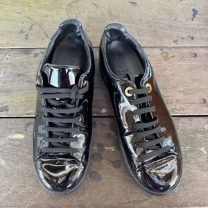 Louis Vuitton Black Patent Leather Low-Top Sneakers with Gold Eyelets